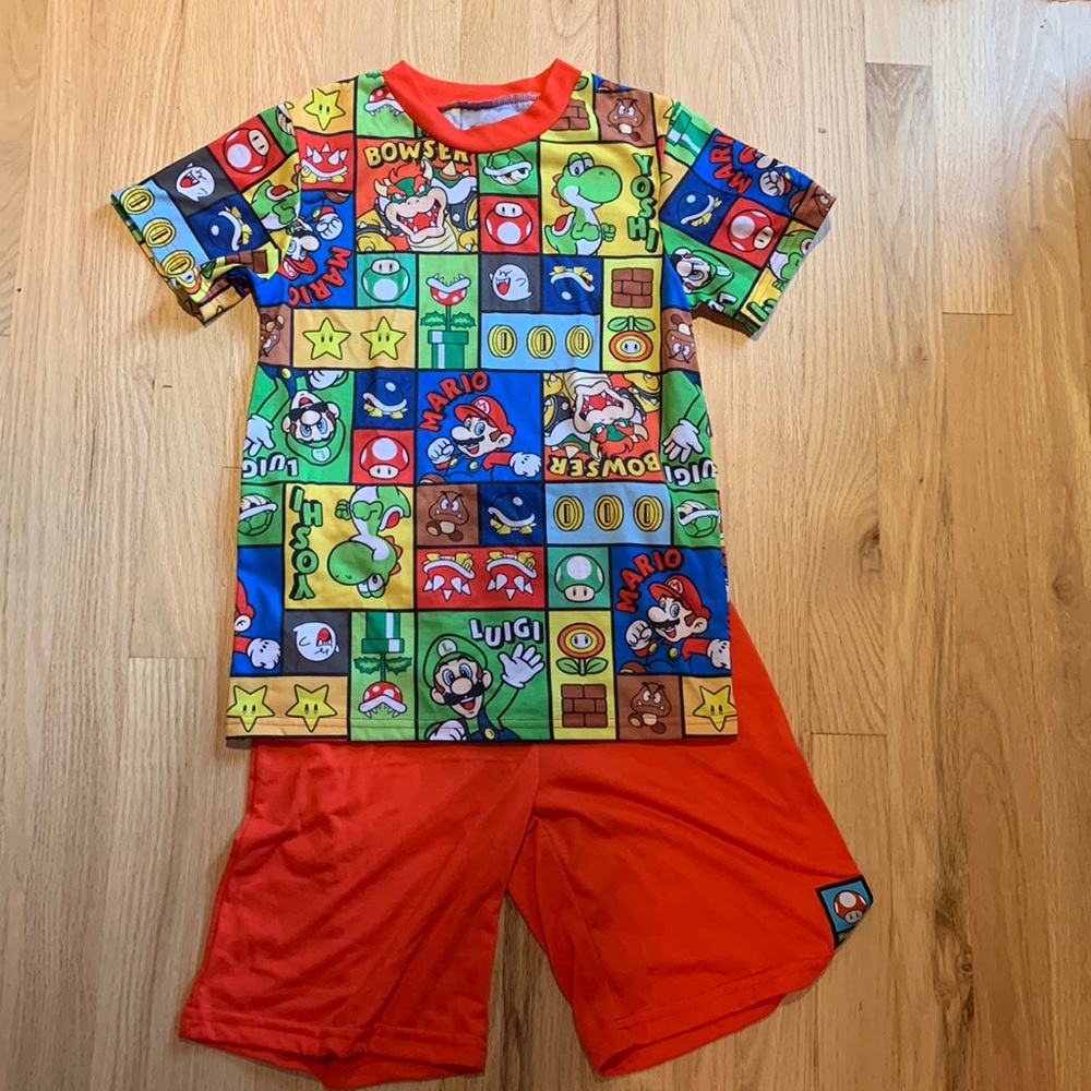 Super Mario short PJ made of fire retardant fabric. Runs big. Never worn.